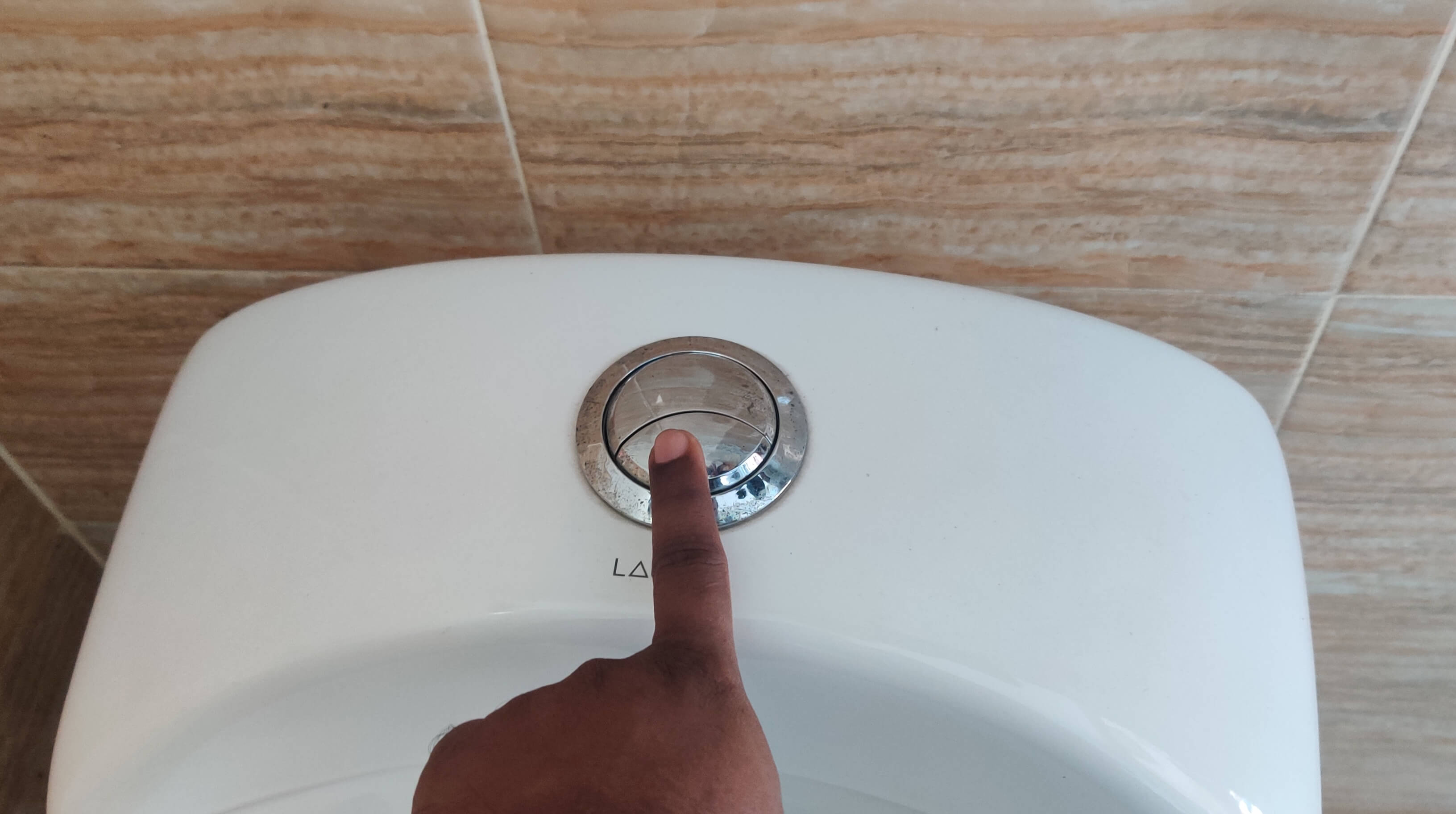 How to Fix A Running Toilet with A Button Flush